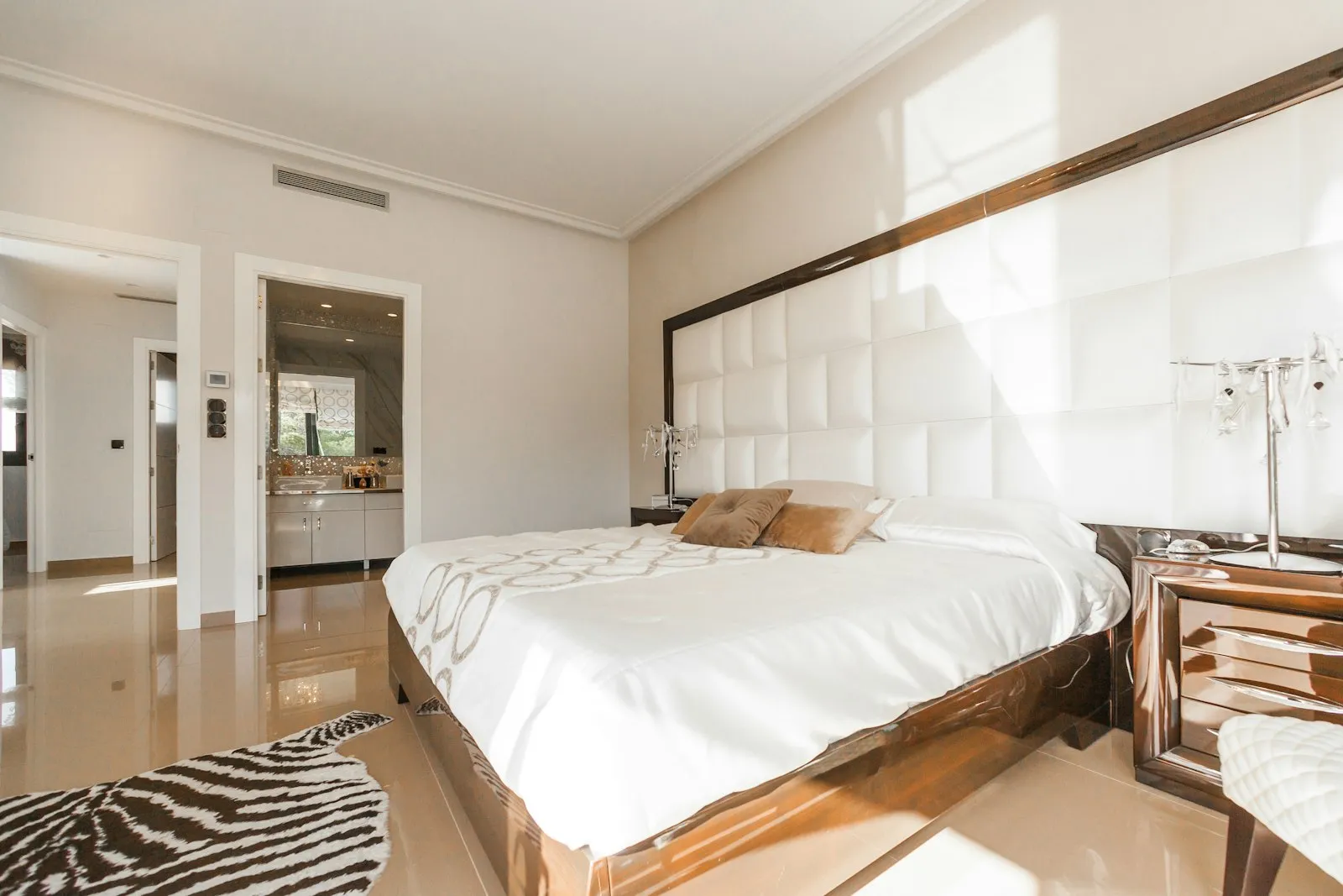 Hotel-style bedroom with turned-down bed